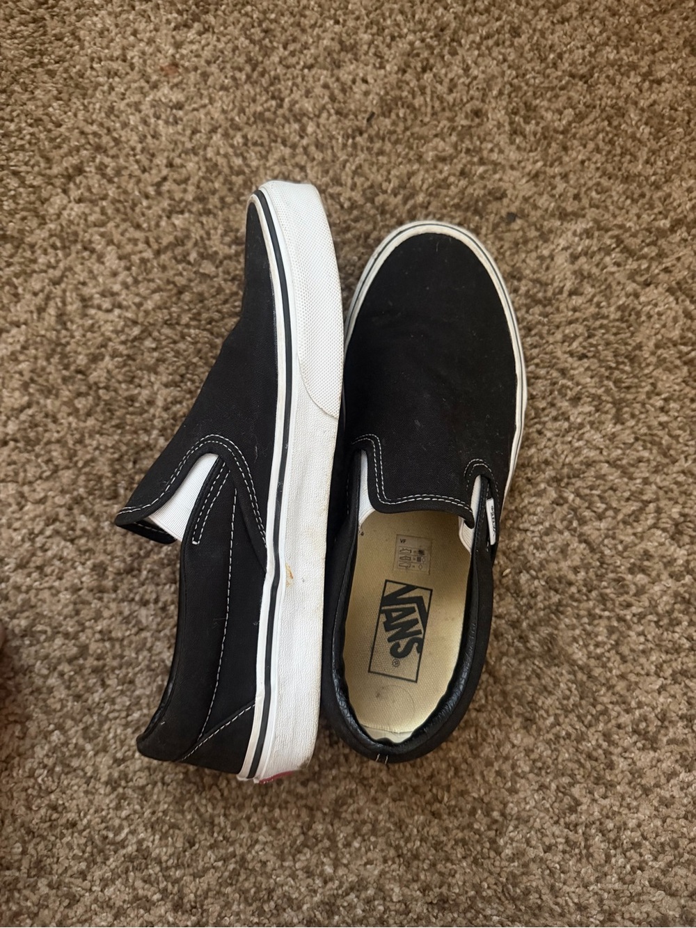 Vans Womens Classic Slip-On Sneakers in Black and White